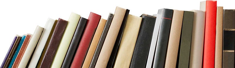 Stack of books on a shelf for cyber threat intelligence reading