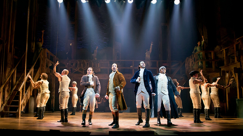 Hamilton cast performing on stage at the Richard Rodgers Theatre